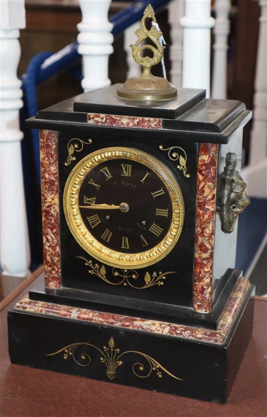 A Victorian black slate and marble mantel clock